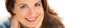 older woman with wrinkles around her eyes
