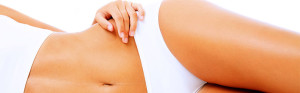 woman laying down touching her hip